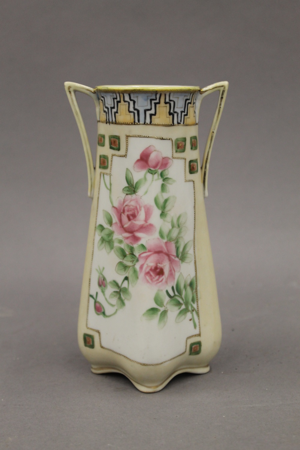 A pair of Japanese porcelain vases decorated with roses. 17.5 cm high. - Image 3 of 4