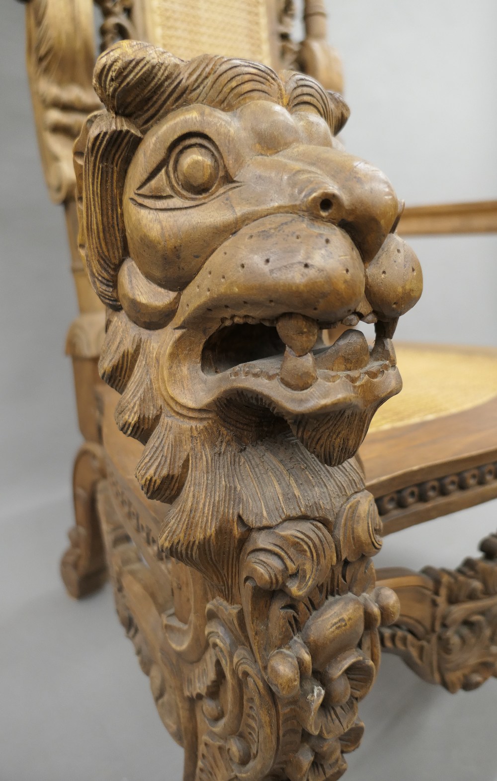 A large Eastern, possibly Indonesian, carved and caned open armchair. 94 cm wide x 180 cm high. - Image 3 of 6