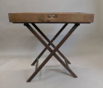 A Victorian mahogany butlers tray on stand. 82.5 cm wide.