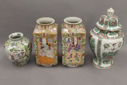 A Chinese vase with six character mark to base; a pair of Chinese vases of square form,