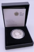 A boxed silver proof 5 pound coin