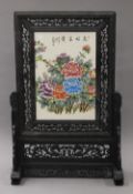 A Chinese table screen. 67.5 cm high.