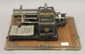 A cased Electrical Company Ltd London Mignon Model 2 typewriter, manufactured in Berlin.
