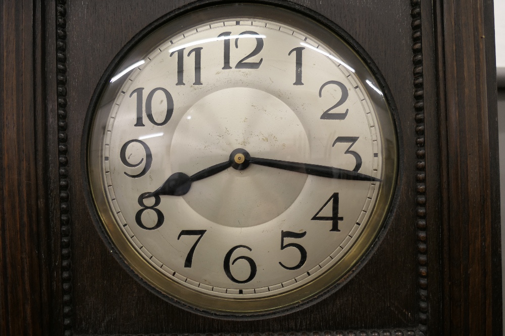 An early 20th century oak cased glass fronted longcase clock. 212 cm high. - Image 2 of 6