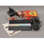 A vintage Atari 2600 games console and games