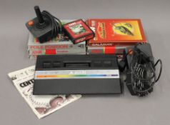 A vintage Atari 2600 games console and games