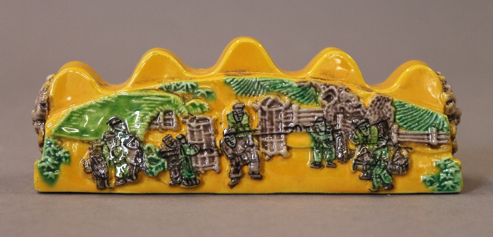 A Chinese yellow porcelain brush rest. 12.5 cm long. - Image 2 of 4