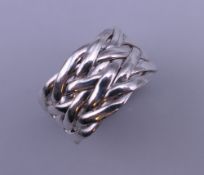 A silver plait/knot ring. Ring size Q.