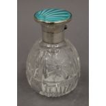 A cut glass silver and turquoise enamel topped scent bottle, hallmarked for Birmingham 1937.