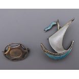 A small sterling silver Charles Horner brooch and a 925 silver and enamel ship form brooch.