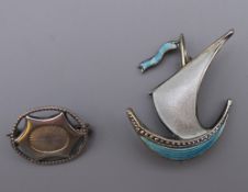 A small sterling silver Charles Horner brooch and a 925 silver and enamel ship form brooch.