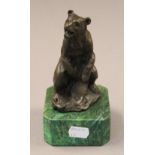 A bronze model of a bear. 16.5 cm high.