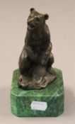 A bronze model of a bear. 16.5 cm high.