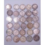 Thirty silver 3pence coins,