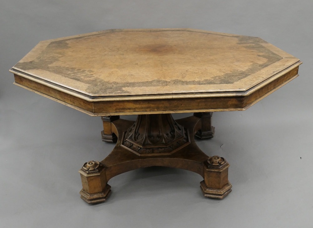 A Victorian burr walnut octagonal loo table. 144 cm wide.