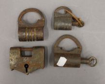 Four Indian padlocks. The largest 8 cm wide.