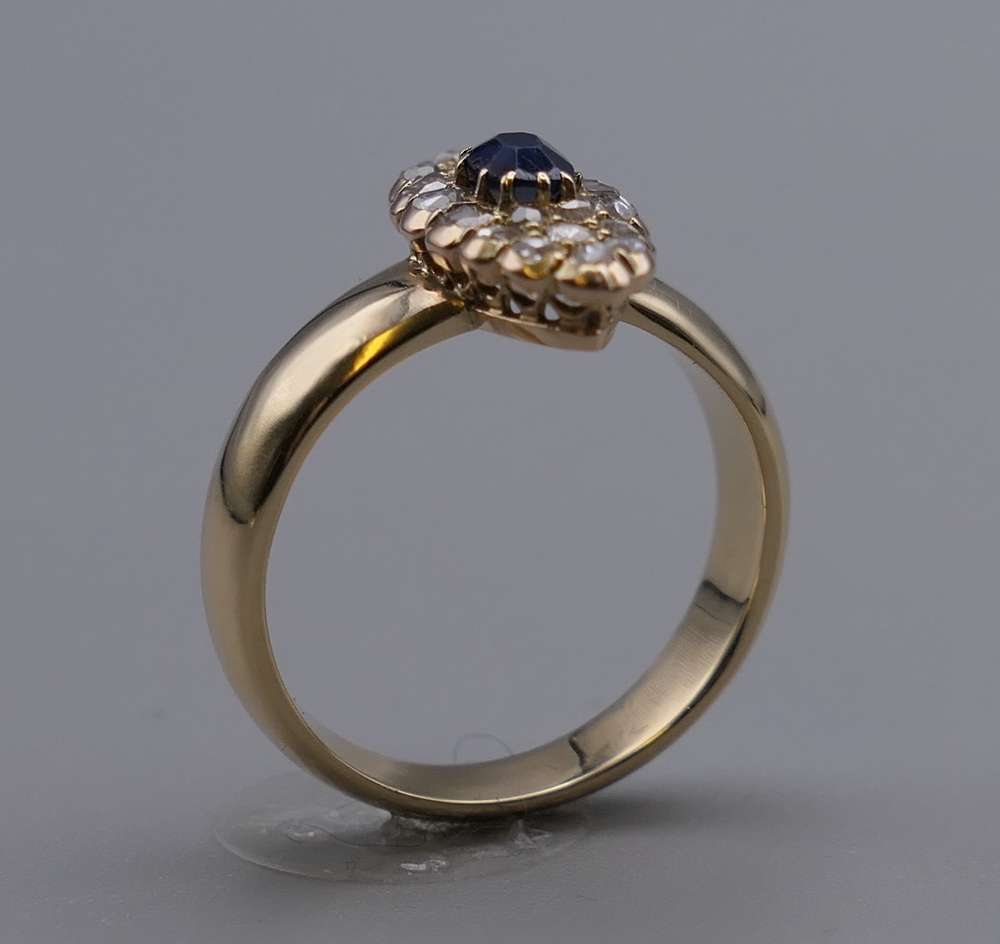 An antique 18 ct gold (tested) pave set diamond and sapphire navette shaped ring. Ring size P. 6. - Image 2 of 5