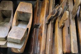 A large quantity of tools, including vintage planes.