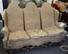 A late 19th/early 20th century triple camel back settee. 220 cm wide.