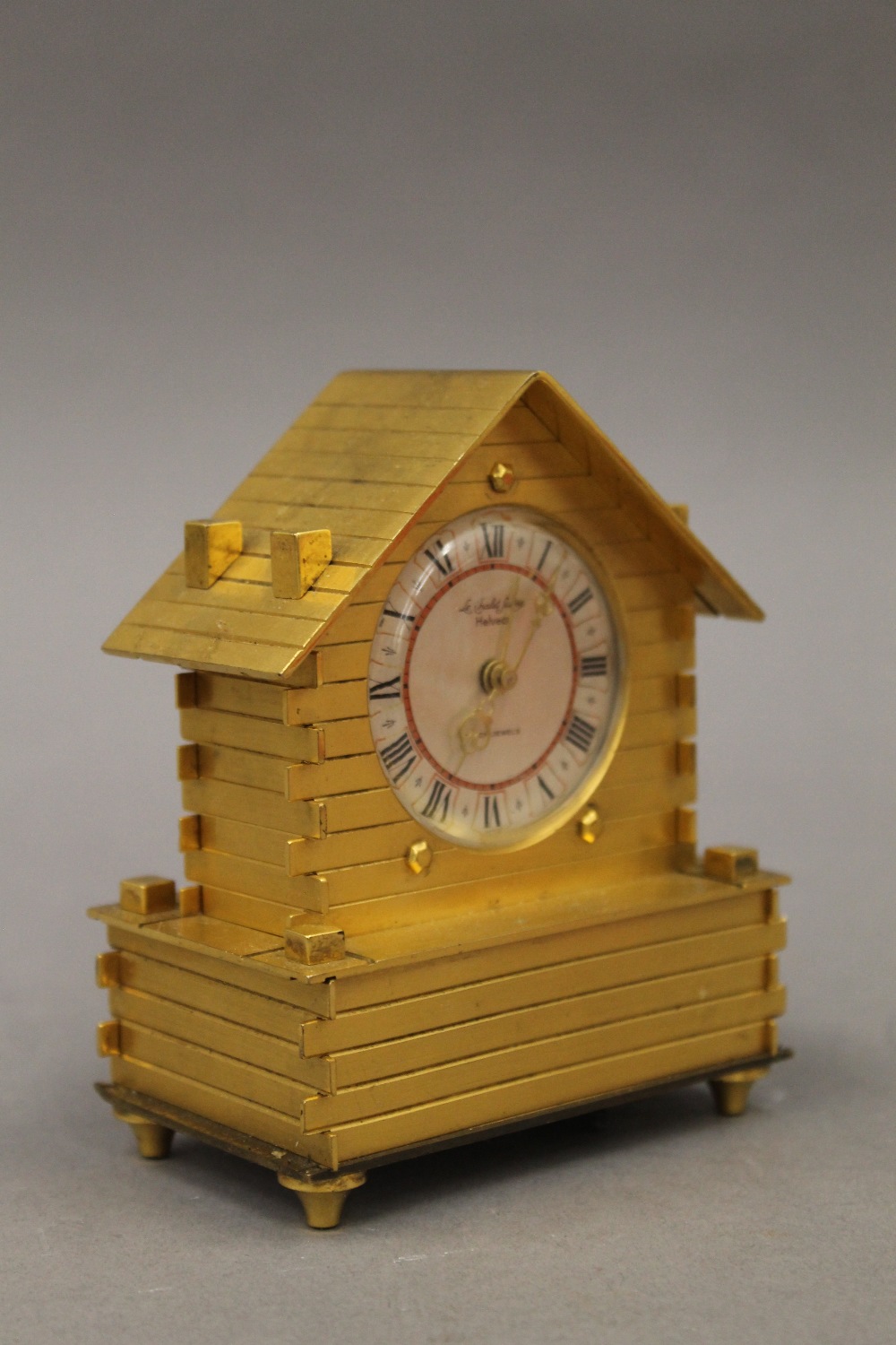 A brass cased Swiss desk clock formed as a Chalet. 11 cm high. - Image 3 of 5
