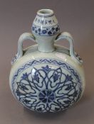 A Chinese blue and white porcelain moon vase. 28 cm high.