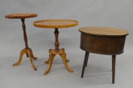 Three modern side tables and a sewing box.