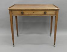 A 19th century mahogany single drawer side table. 91 cm wide.