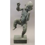 A patinated bronze model of a baby. 60 cm high.