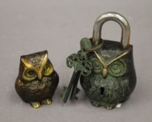 An owl formed padlock and a brass model of an owl. The latter 6.5 cm high.