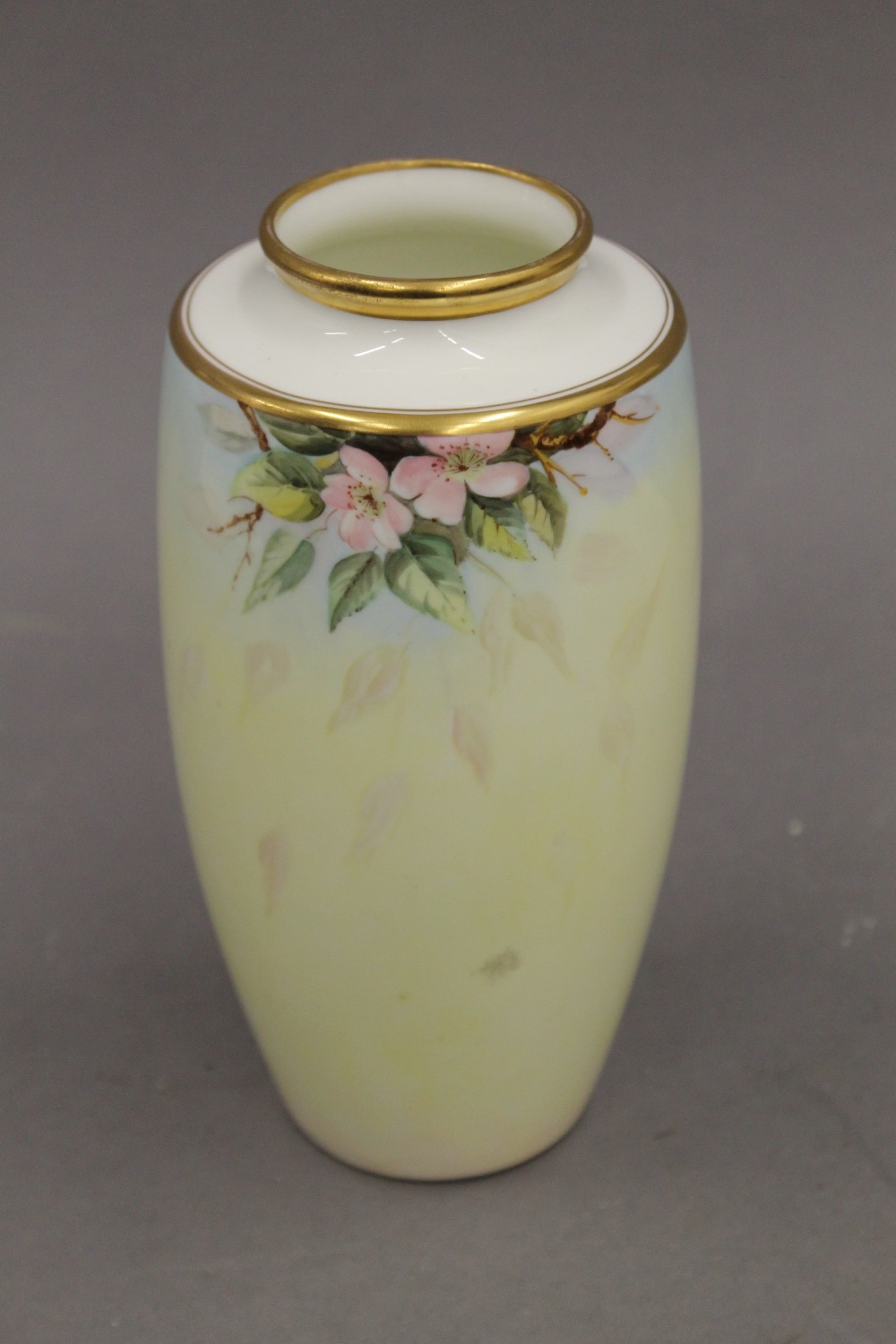 A Worcester style fruit painted vase, signed E Woodhouse. 18 cm high.