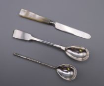 A 19th century Russian silver and niello teaspoon, 84 mark and initials,