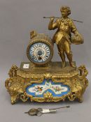 A 19th century porcelain mounted clock. 36 cm high.