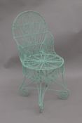 A 19th century wire work garden chair. 92 cm high.