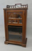 A Victorian walnut music cabinet. 54.5 cm wide.