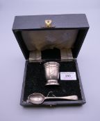 A cased silver Christening set inscribed ''Richard''.