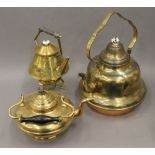 Three brass kettles. The largest 38 cm high.