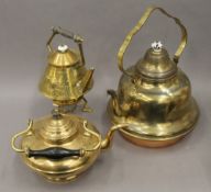 Three brass kettles. The largest 38 cm high.