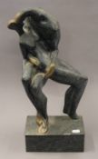 A patinated bronze abstract model of lovers. 46 cm high.