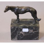 A bronze model of a greyhound. 15 cm long.