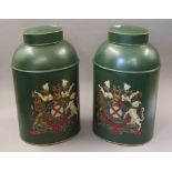 A pair of green toleware tea tins. 44 cm high.