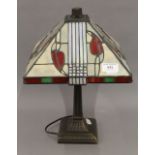A Tiffany style table lamp. 38 cm high.