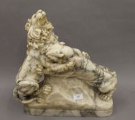 A Victorian carved alabaster animalier group formed as fighting lions. 43 cm high.