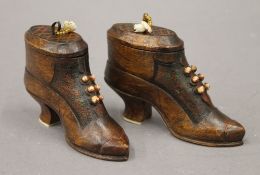 Two treen snuff shoes. Each 7 cm high.