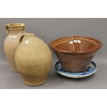 Four items of cottage pottery, including a dairy bowl. 38 cm diameter.