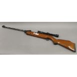 A Webley air rifle with Nikko Stirling Tiara 4x28 image moving scope.