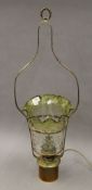 A Victorian brass and glass hanging oil lamp (converted to electricity). 80 cm high.