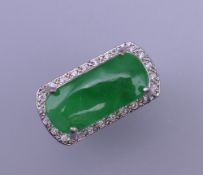 A jade set dress ring. Ring size P/Q.