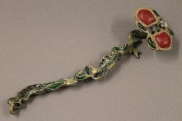 A Chinese ruyi sceptre. 26.5 cm long.