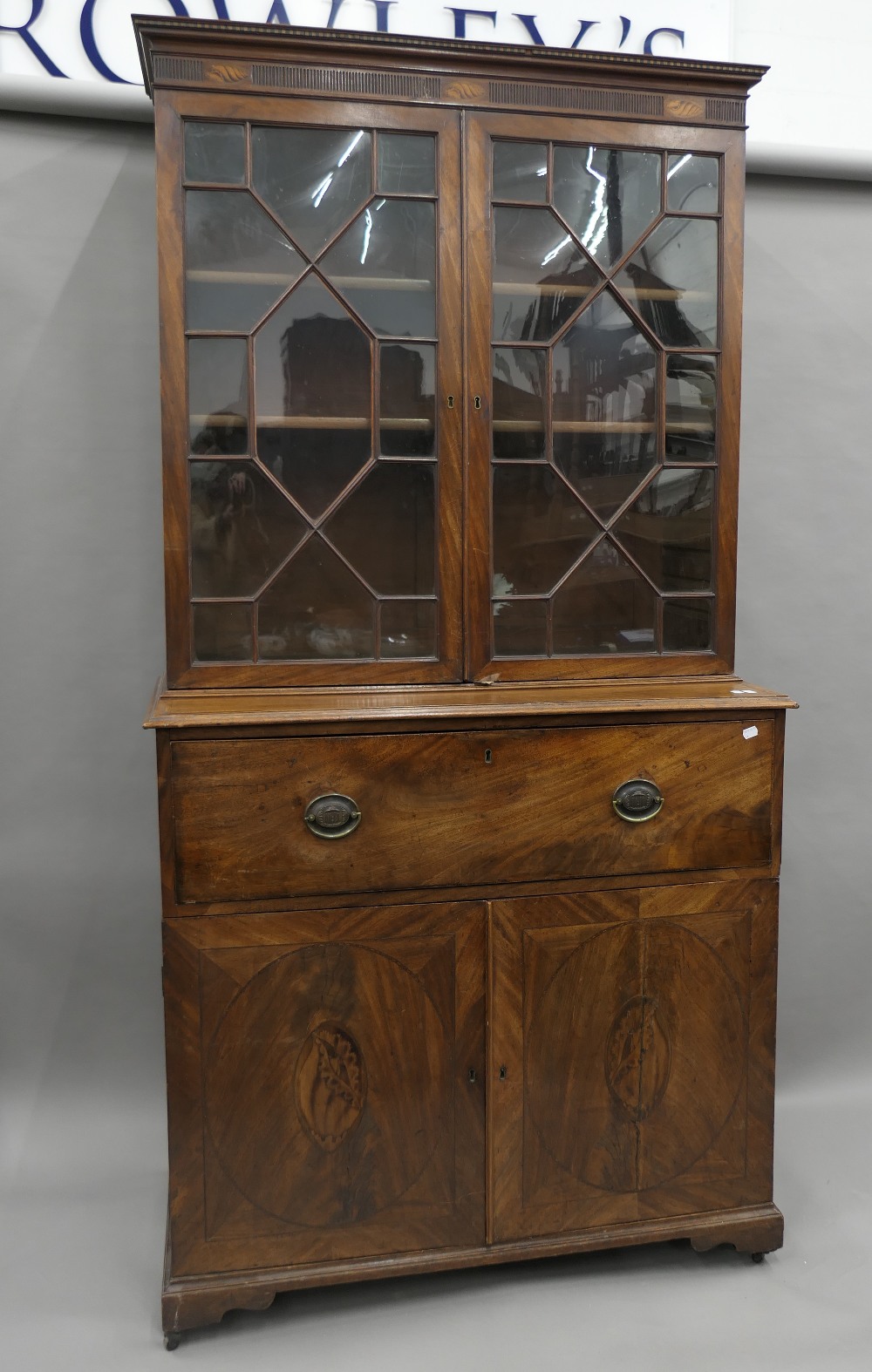 A George III mahogany secretaire bookcase. 206 cm high.