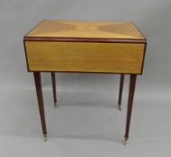 An inlaid sewing machine table and a reproduction torchere. The latter 101 cm high.